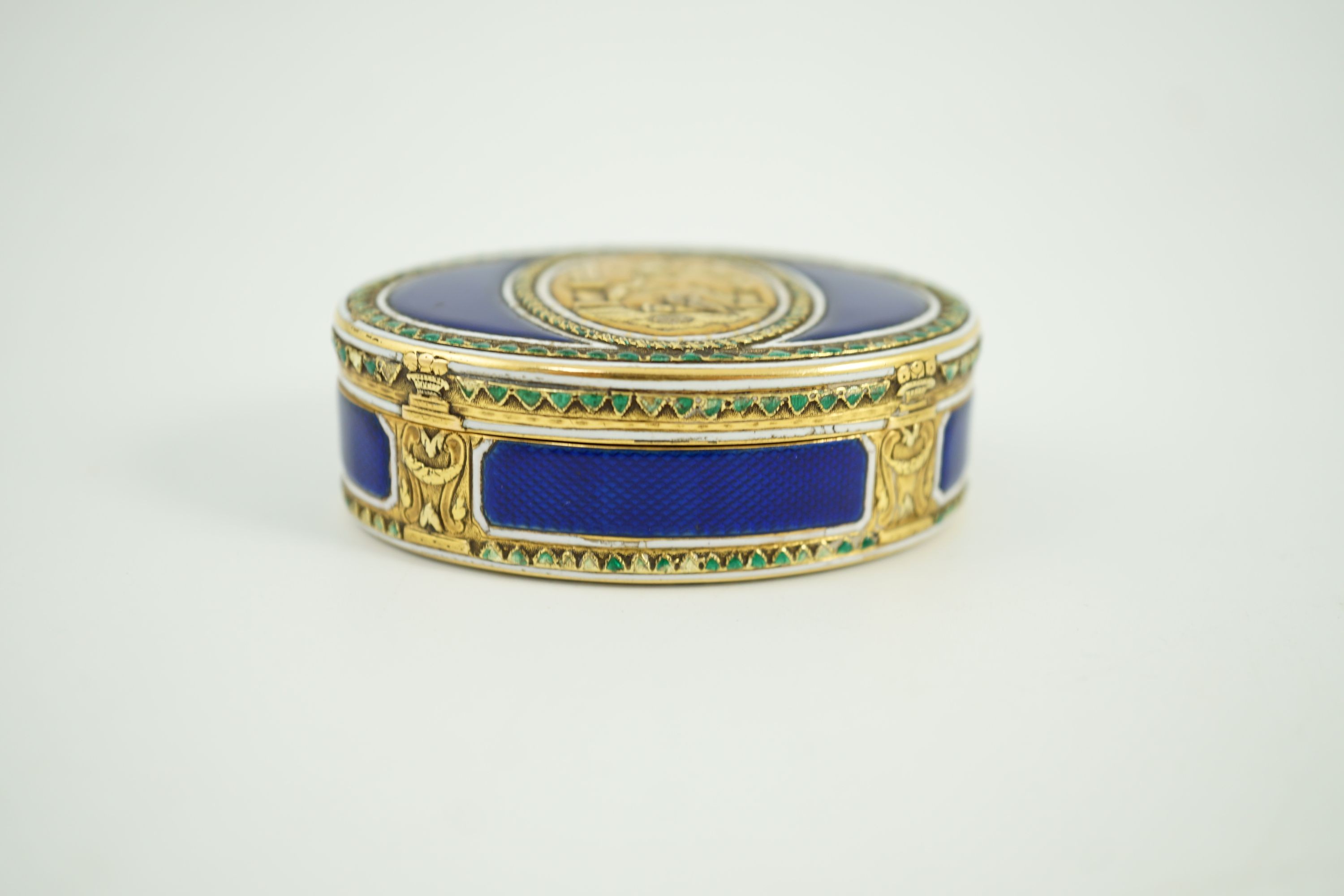 A late 18th/early 19th century French? gold and polychrome enamel oval snuff box